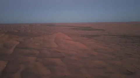 Aerial view of Tengger Desert dunes at dawn Stock Footage 345370144