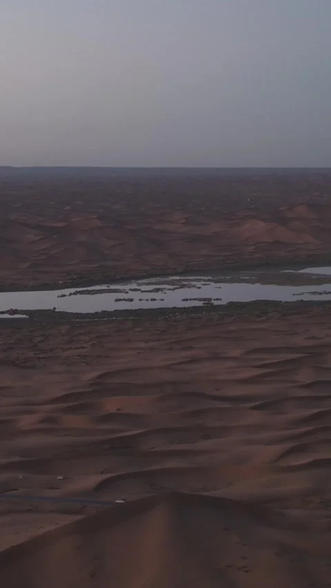 Aerial View of Tengger Desert Dunes and Oasis Lake 스톡 동영상 345370378