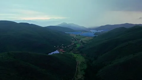 Aerial view of a tented eco-camp and irrigation reservoirs, Robertson valley Stock Footage 342353943
