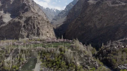Aerial view of terraced fields in a mountainous region of Pakistan, highlighting 스톡 동영상 317958181