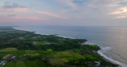 Aerial view of terraced rice fields in a green forest, blending agriculture Stock Footage 276517274