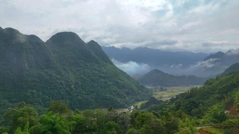Aerial view of terraced rice fields and mountains in Pu Luong, Thanh Hoa 4K Stock Footage 313666829