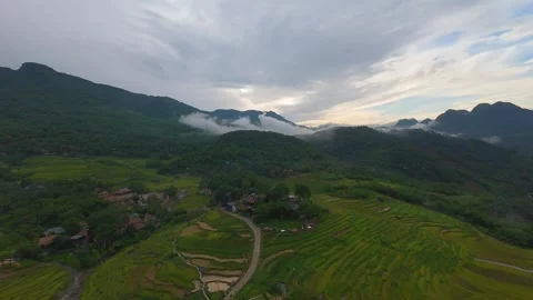 Aerial view of terraced rice fields and mountains in Pu Luong, Thanh Hoa 4K Stock Footage 313667197