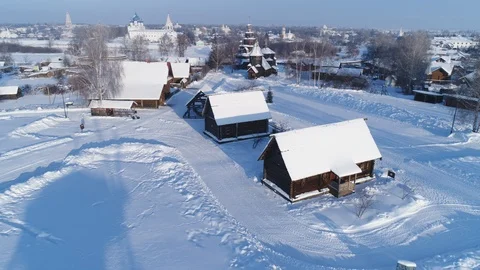 Aerial view of the territory of a small Russian village in a snowy winter Stock Footage 101454018