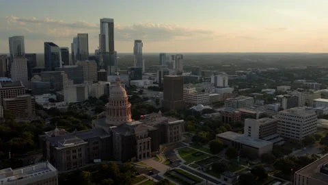 Aerial View of the Texas State Capitol and Downtown Austin Skyline at Sunset Stock Footage 334360289