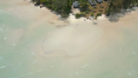 Aerial View Of The Text 'SUBSCRIBE' Written On White Sandy Tropical Beach. Stock Footage 278315085