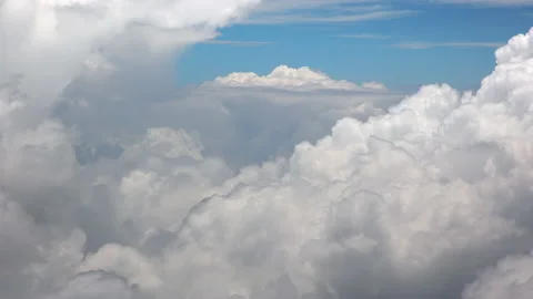 Aerial view of textured clouds in the blue sky. Stock Footage 155585043