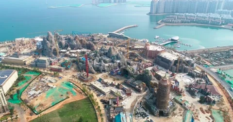 Aerial view of a theme park under construction on a man made island in Haina Stock Footage 347457785