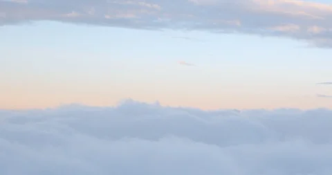 Aerial view of a thick clouds moving slowly and low Stock Footage 91652870