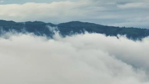 Aerial view of thick clouds rolling over green hills, Bangladesh. Stock Footage 336175162