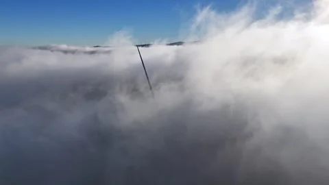 Aerial view of thick white clouds under a blue sky, Austria. Stock Footage 335274212