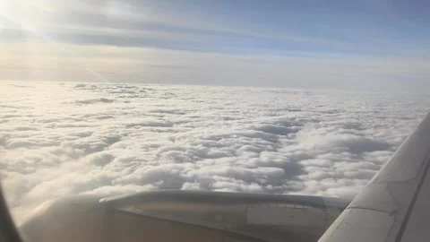 Aerial view of thick white clouds during flight Stock Footage 340130648
