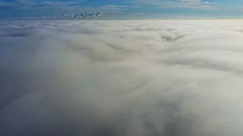 Aerial view of thick white clouds over Latvia. Stock Footage 345005870
