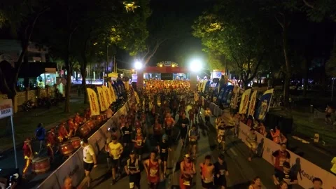Aerial view of thousand of runners started the marathon in front of Saigon Zo Stock Footage 157118322
