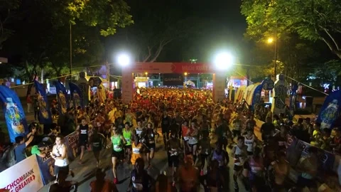 Aerial view of thousand of runners started the marathon in front of Saigon Zo Stock Footage 157118329