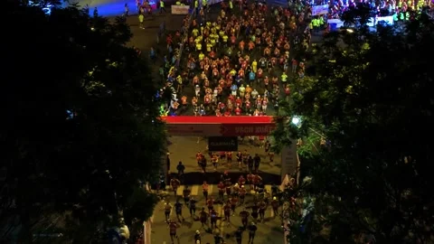 Aerial view of thousand of runners started the marathon in front of Saigon Zo Stock Footage 157118462