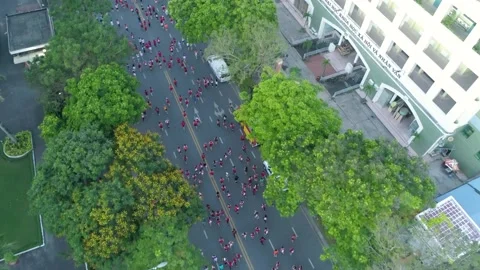 Aerial view of thousand of runners started the marathon in front of Saigon Zo Stock Footage 157118484