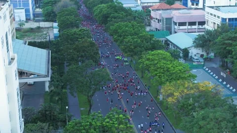 Aerial view of thousand of runners started the marathon in front of Saigon Zo Stock Footage 157118605