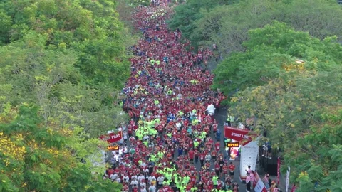 Aerial view of thousand of runners started the marathon in front of Saigon Zo Stock Footage 158234592