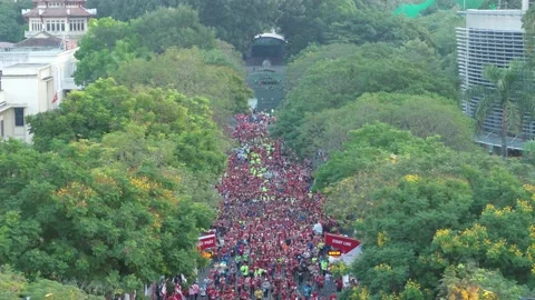 Aerial view of thousand of runners started the marathon in front of Saigon Zo Stock Footage 158234659