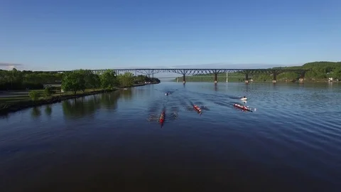 Aerial view of three crew boats racing Stock Footage 80666196