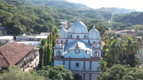 Aerial view of a three domes old church in Pespire Stock Footage 146708511