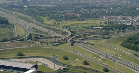 Aerial view of three intersecting highways in Europe Vidéo 114133733