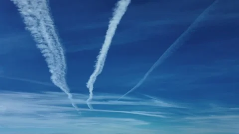 Aerial View of Three Parallel Contrails in a Blue Sky: Footage Taken From a Jet Video stock 318455605