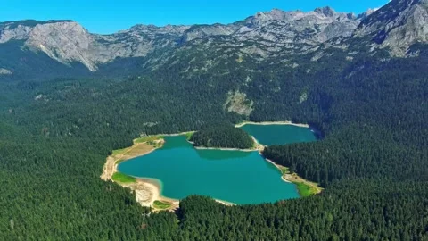 Aerial view of three turquoise mountain lakes and green forest Stock-Footage 341328664