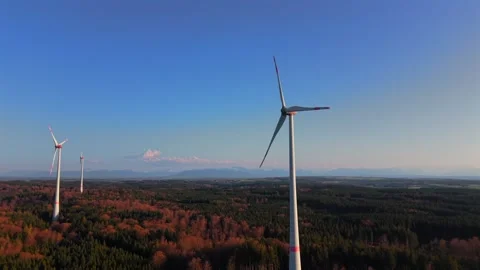 Aerial view of three wind turbines over autumn forest near Starnberg, Germany Stock Footage 332613466