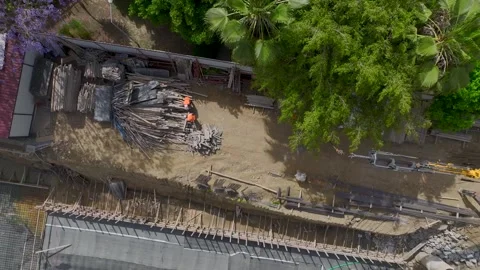 Aerial View: A thriving project site with foundation insulation and metal Stock Footage 296095850