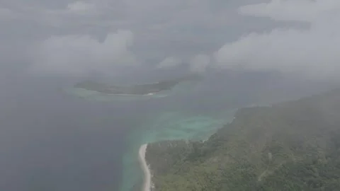 Aerial View Through Clouds Over Coastline of Koh Lipe Island, Thailand Stock Footage 337482578