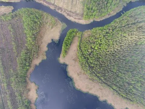 Aerial view through clouds Stock Photos