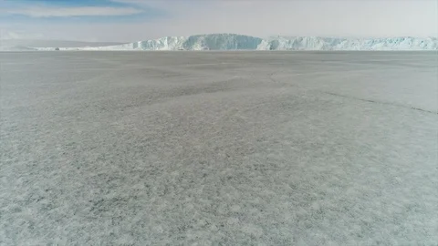 Aerial view. Thrown broken plane lies in the snow. Antarctica Stock Footage 119564215