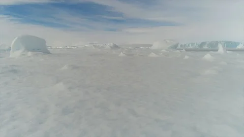 Aerial view. Thrown broken plane lies in the snow. Antarctica Stock Footage 119566211
