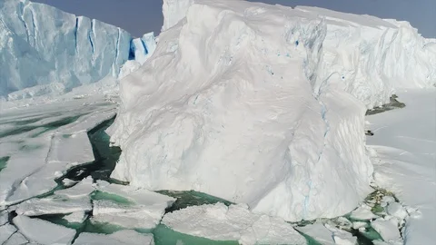 Aerial view. Thrown broken plane lies in the snow. Antarctica Stock Footage 119566725