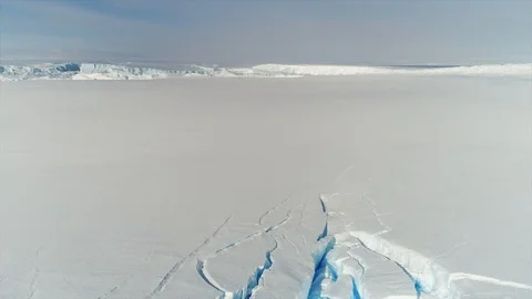 Aerial view. Thrown broken plane lies in the snow. Antarctica Stock Footage 119566877