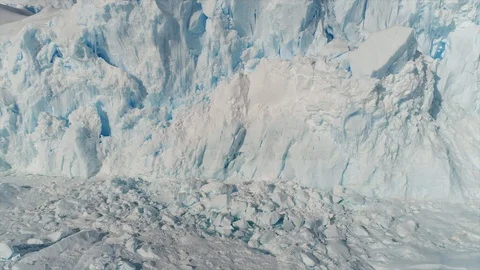 Aerial view. Thrown broken plane lies in the snow. Antarctica Stock Footage 119567100