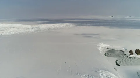 Aerial view. Thrown broken plane lies in the snow. Antarctica Stock Footage 119567187