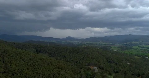 Aerial view of thunder storm over mountains,sunshine Coast,queensland,Australia Stock Footage 100279196