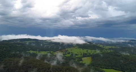 Aerial view of thunder storm over mountains,sunshine Coast,queensland,Australia Stock Footage 100290352