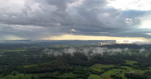 Aerial view of thunder storm over mountains,sunshine Coast,queensland,Australia Stock Footage 100308946