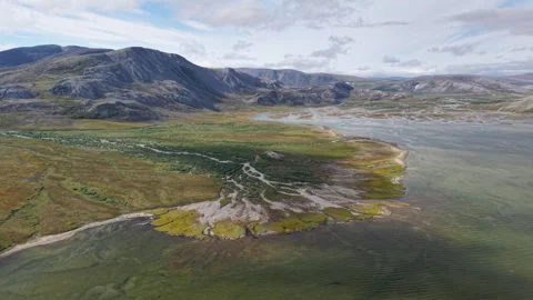 Aerial view of tidal flats and braided channel at Lavrentiya Bay, Chukotka Stock Footage 327120425