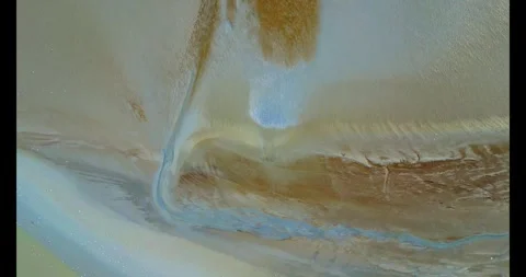 Aerial view of the tidal mudflats in the Eemsdelta, Holland Stock Footage 323023099