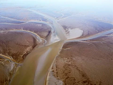 Aerial view of the tidal mudflats in the Eemsdelta, Holland Stock Photos