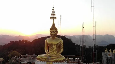 Aerial View of Tiger Cave Temple Buddha With Mountains in Horizon at Sunset Stock Footage 146560238