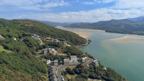 Aerial view, tilt down move. Drone panorama over sea, hills and houses, Barmo Stock-Footage 94251411