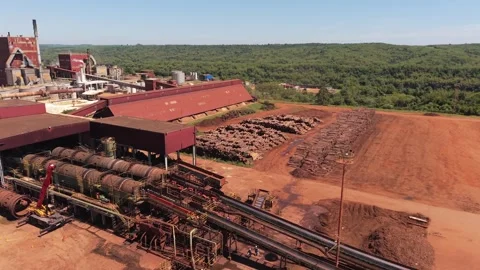 Aerial view of timber storage yard with logs and industrial processing wood Stock Footage 324427418