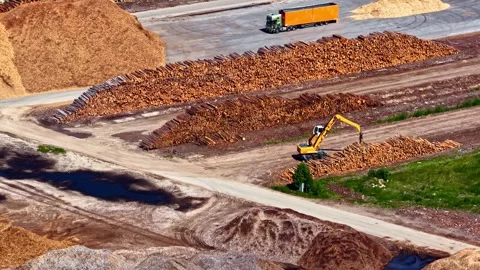 Aerial view of timber yard with excavator and logs in Riga, Latvia. Stock Footage 340810166