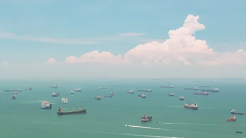 Aerial view, time lapse,  cargo ships of business logistic, Port of Singapore Stock Footage 251345534